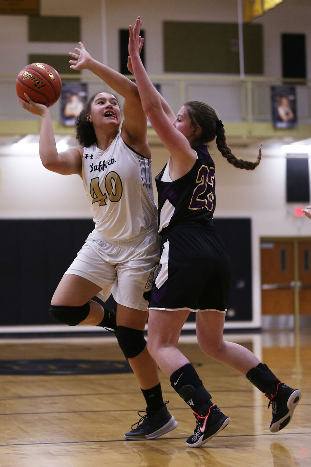 Danica Boyce turns to attempt a 2-point shot against Thermopolis